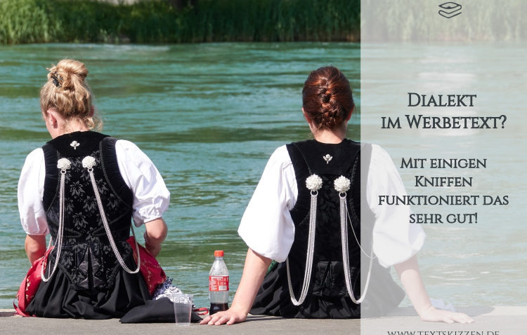 Dialekt in der Werbung: zwei Mädchen im Trachtenkostüm, am Wasser sitzend